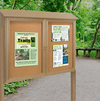 Eco-Design Outdoor Message Center Cork Bulletin Board 60" x 24" with Posts | Faux Wood, Double-Door Standing Information Boards